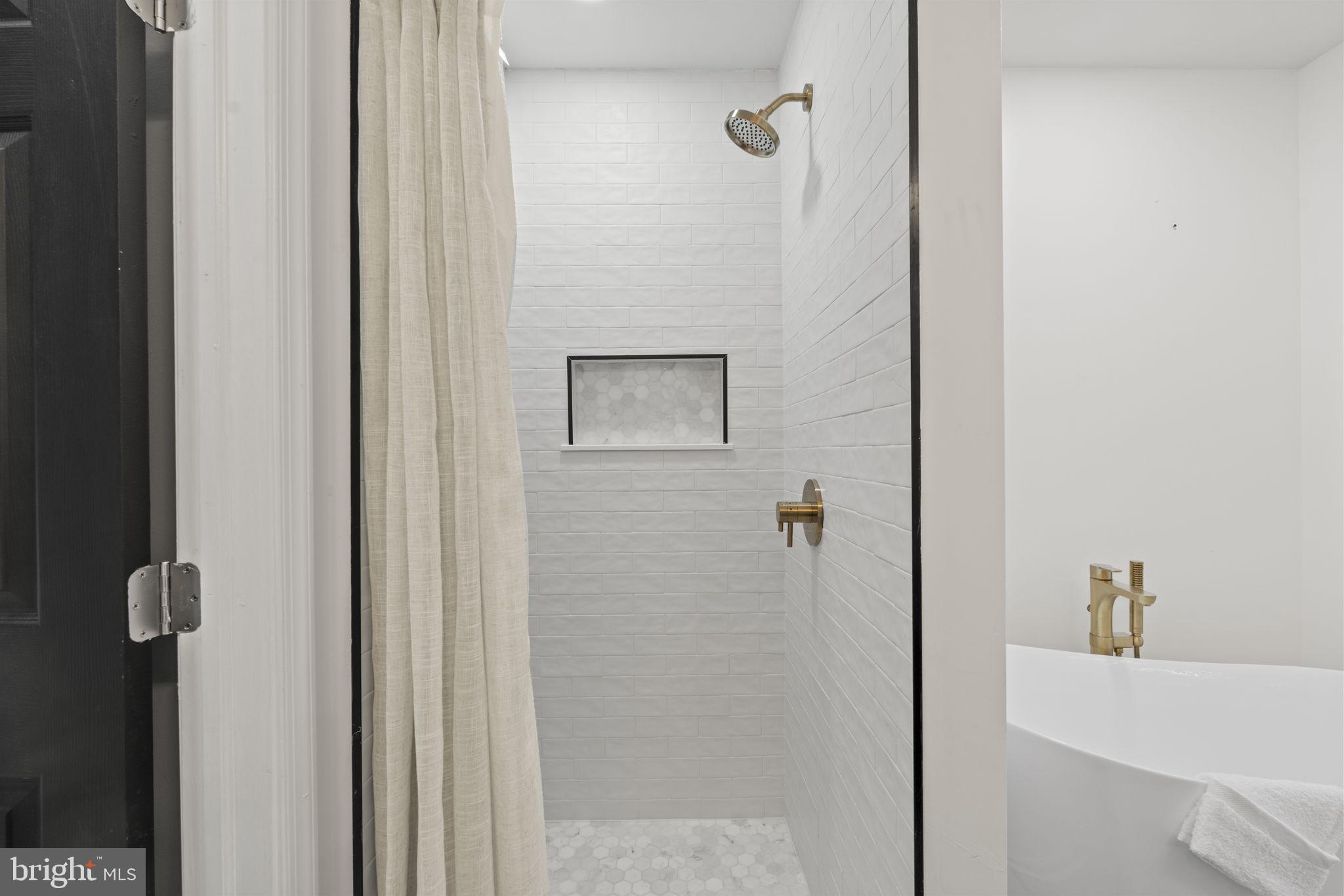 5320 Wynnefield Avenue Philadelphia, PA 19131 - Photo 23 of 33 a bathroom with a bathtub