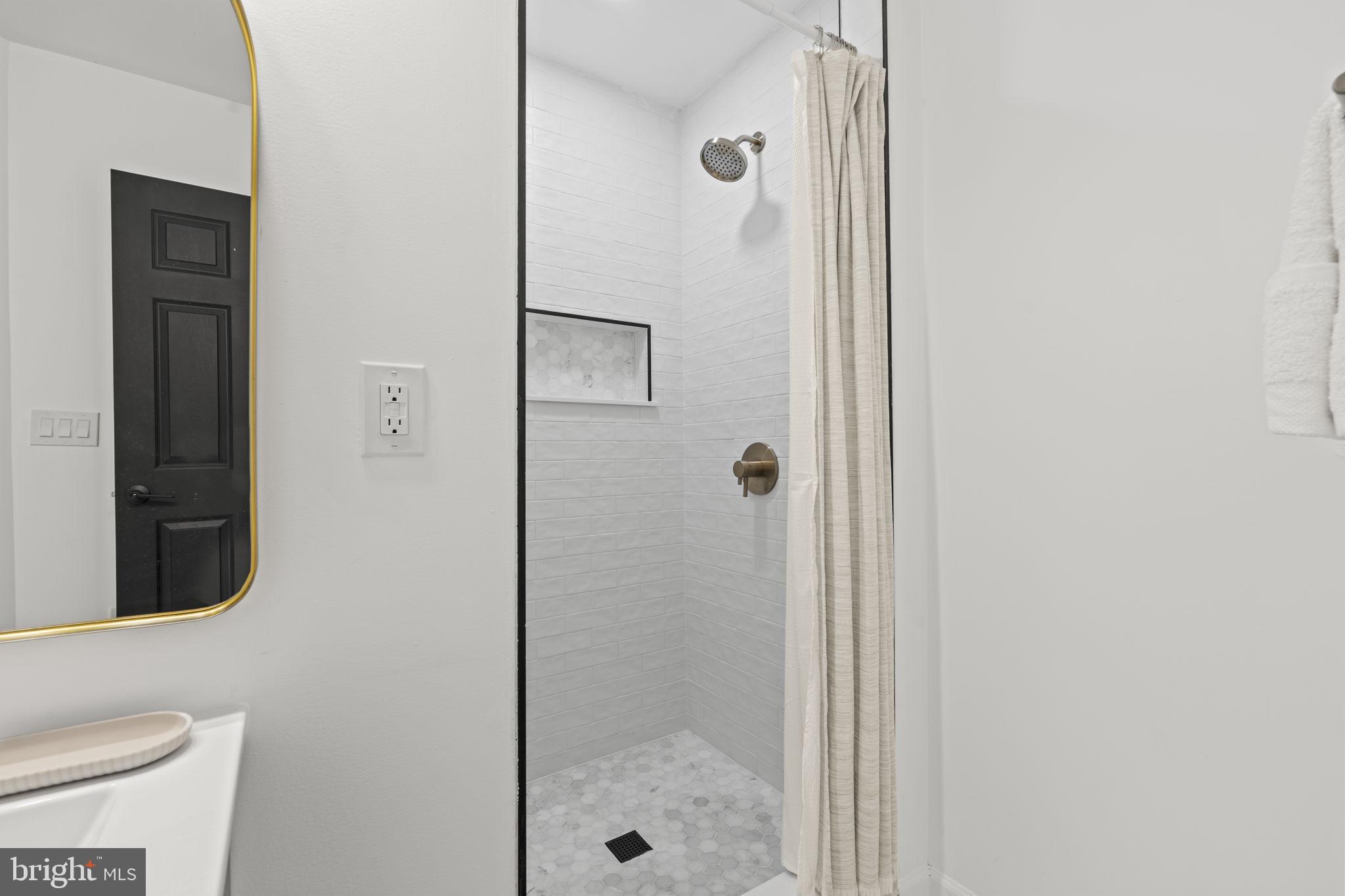 5320 Wynnefield Avenue Philadelphia, PA 19131 - Photo 28 of 33 a bathroom with a shower and toilet