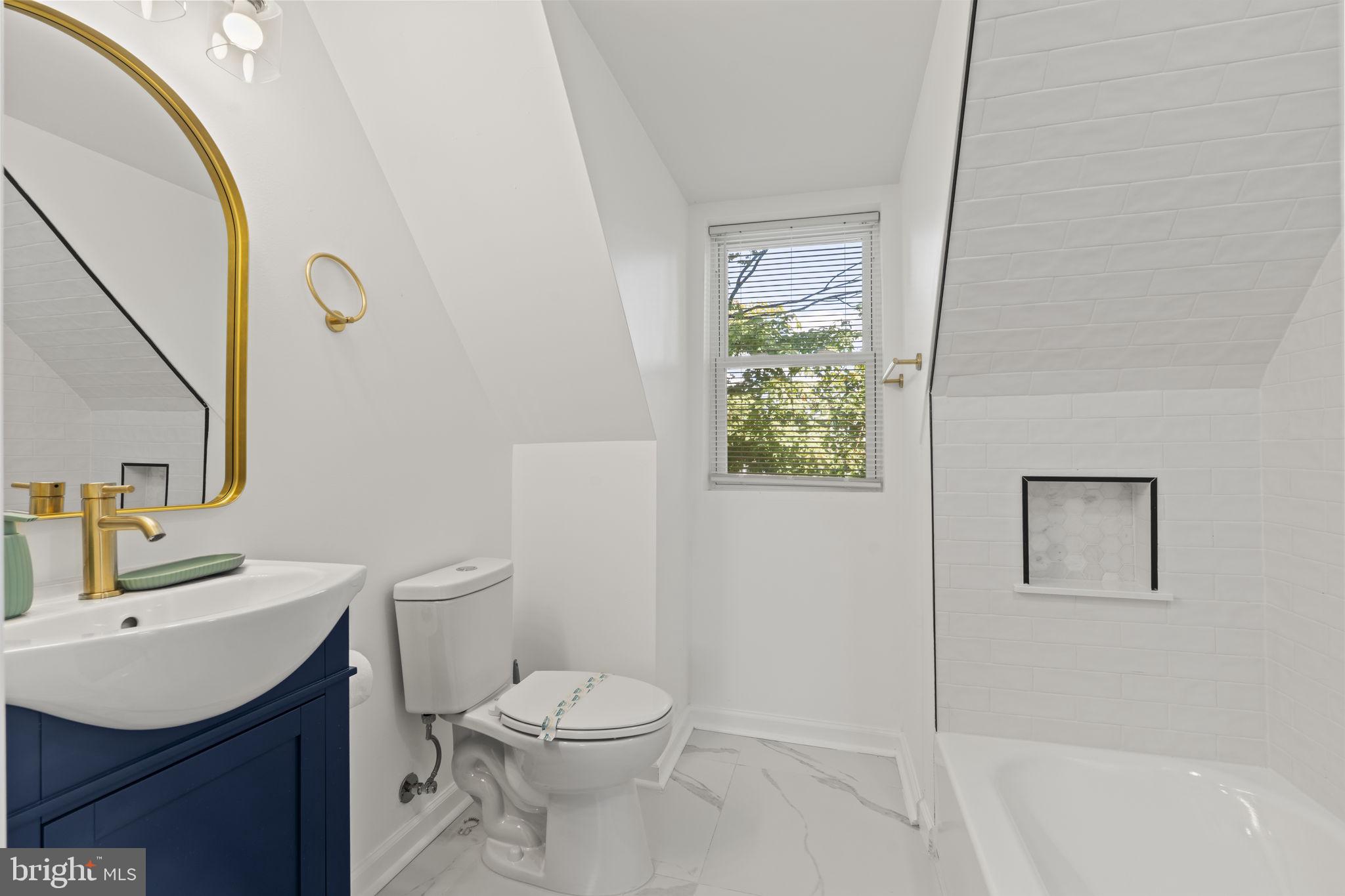 5320 Wynnefield Avenue Philadelphia, PA 19131 - Photo 30 of 33 a bathroom with a sink toilet and shower