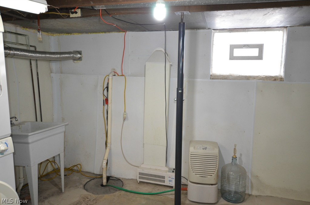 3816 State Road Ashtabula, OH 44004 - Photo 22 of 25 Basement has water proofing system and sump pump. Warranties on these will transfer to new owner.