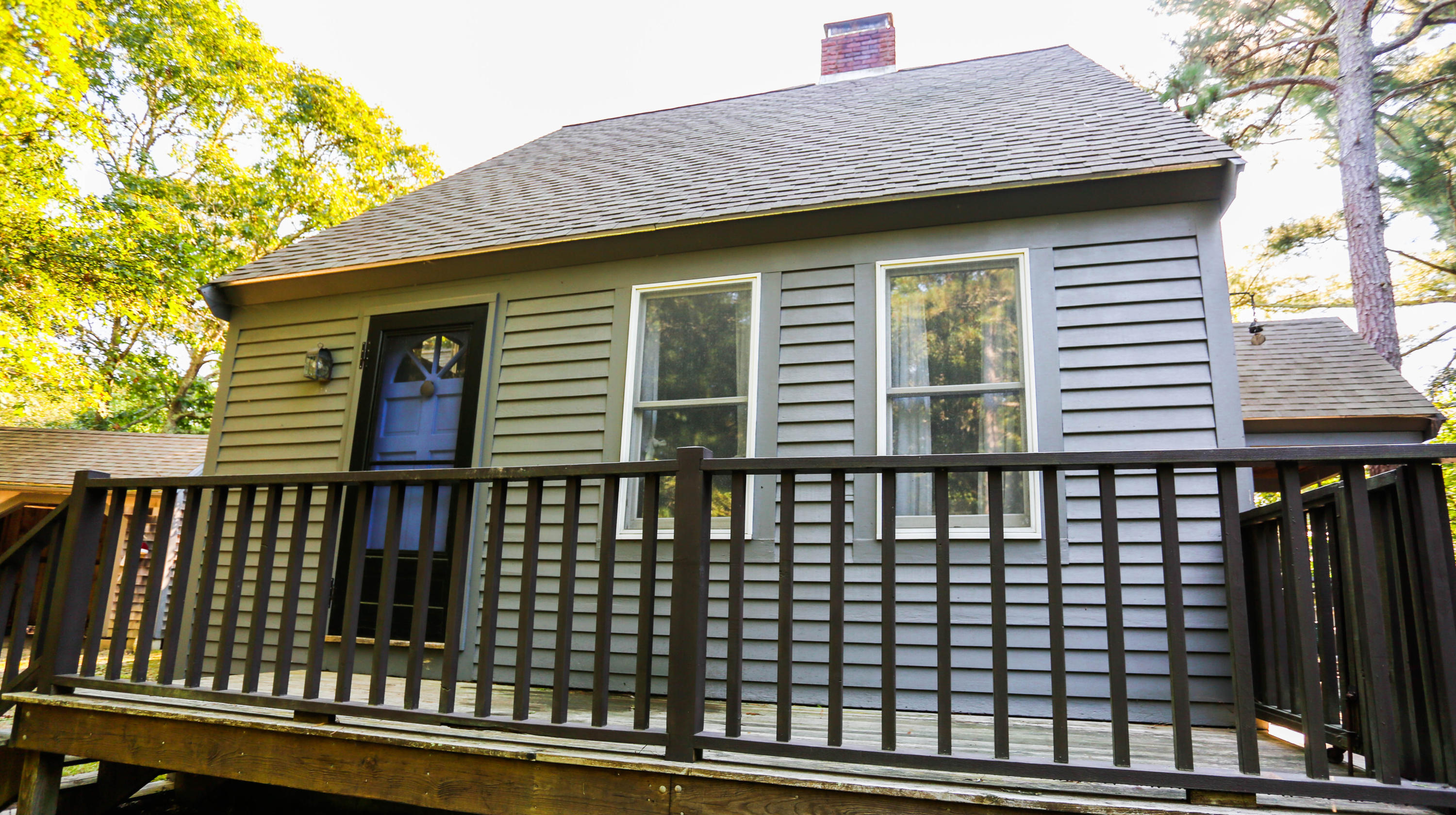 449 Poponessett Road Cotuit, MA 02635 - Photo 1 of 17 a front view of a house