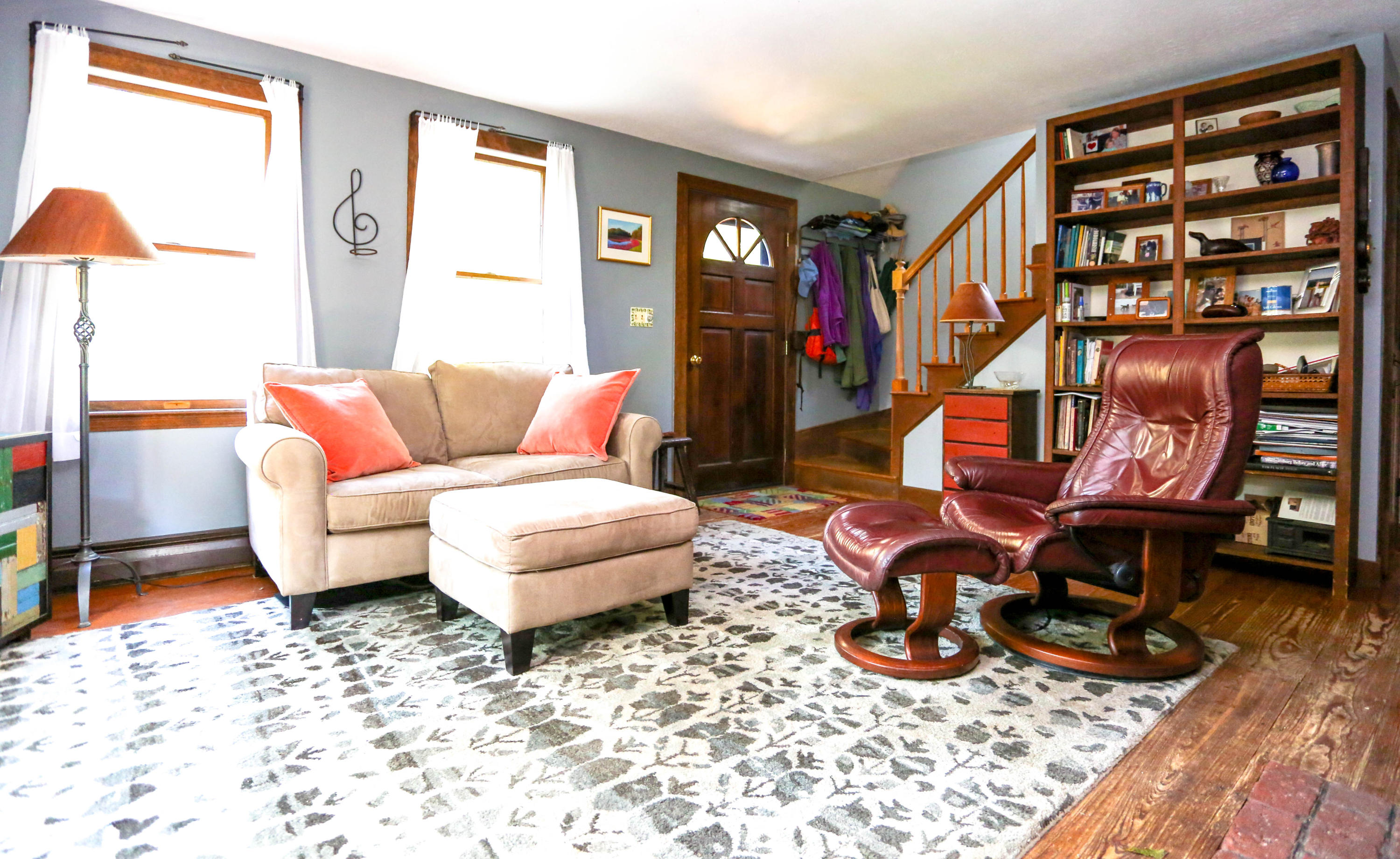 449 Poponessett Road Cotuit, MA 02635 - Photo 6 of 17 a living room with furniture a rug and a window