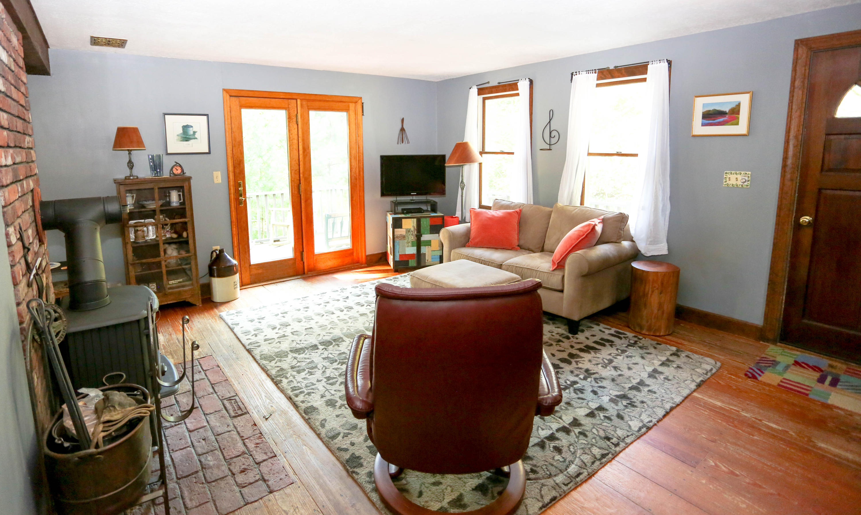 449 Poponessett Road Cotuit, MA 02635 - Photo 7 of 17 a living room with furniture rug and window