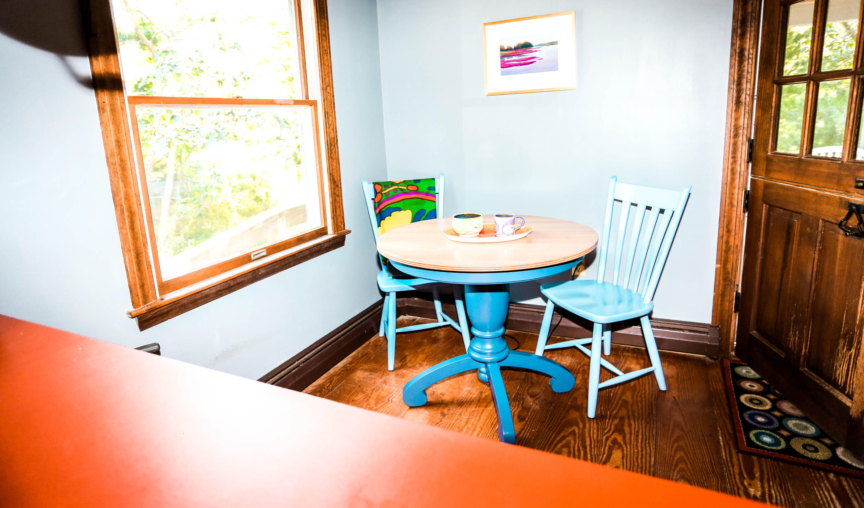 449 Poponessett Road Cotuit, MA 02635 - Photo 10 of 17 a view of a dining room with furniture window and wooden floor