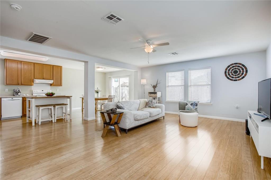 8813 Winter Haven Road Austin, TX 78747 - Photo 11 of 28 a living room with furniture and wooden floor
