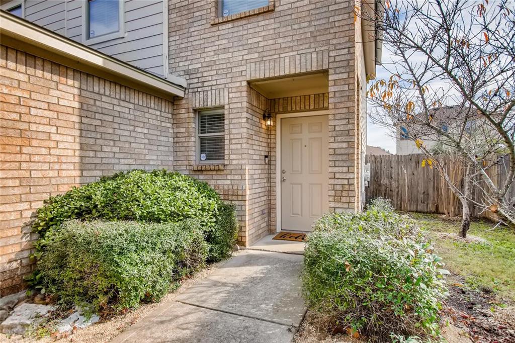 8813 Winter Haven Road Austin, TX 78747 - Photo 28 of 28 a yellow house with outdoor space