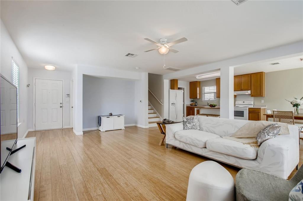8813 Winter Haven Road Austin, TX 78747 - Photo 4 of 28 a living room with furniture and a large window