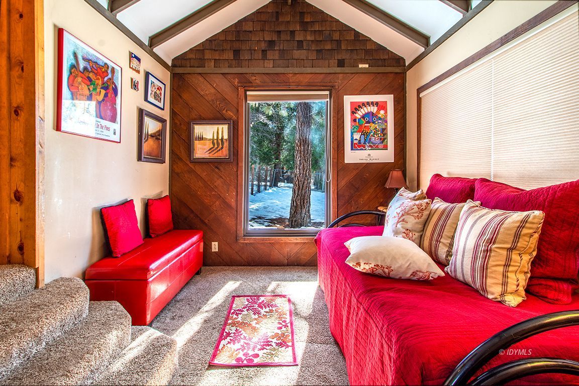 25420 Palomar Road Idyllwild, CA 92549 - Photo 22 of 53 a living room with furniture and a large window