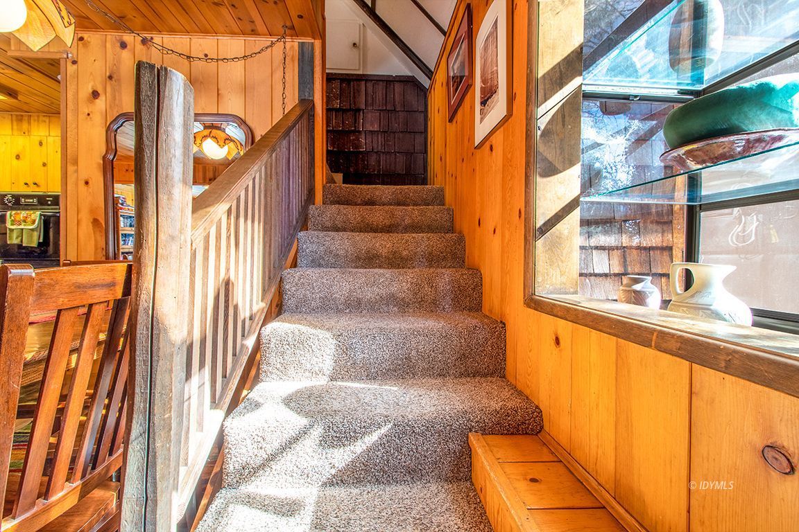 25420 Palomar Road Idyllwild, CA 92549 - Photo 40 of 53 a view of a brick house with large windows