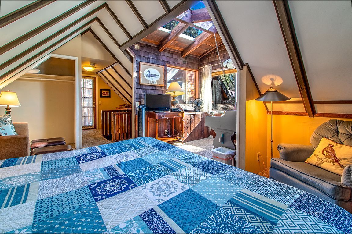 25420 Palomar Road Idyllwild, CA 92549 - Photo 50 of 53 a bedroom with furniture and a window