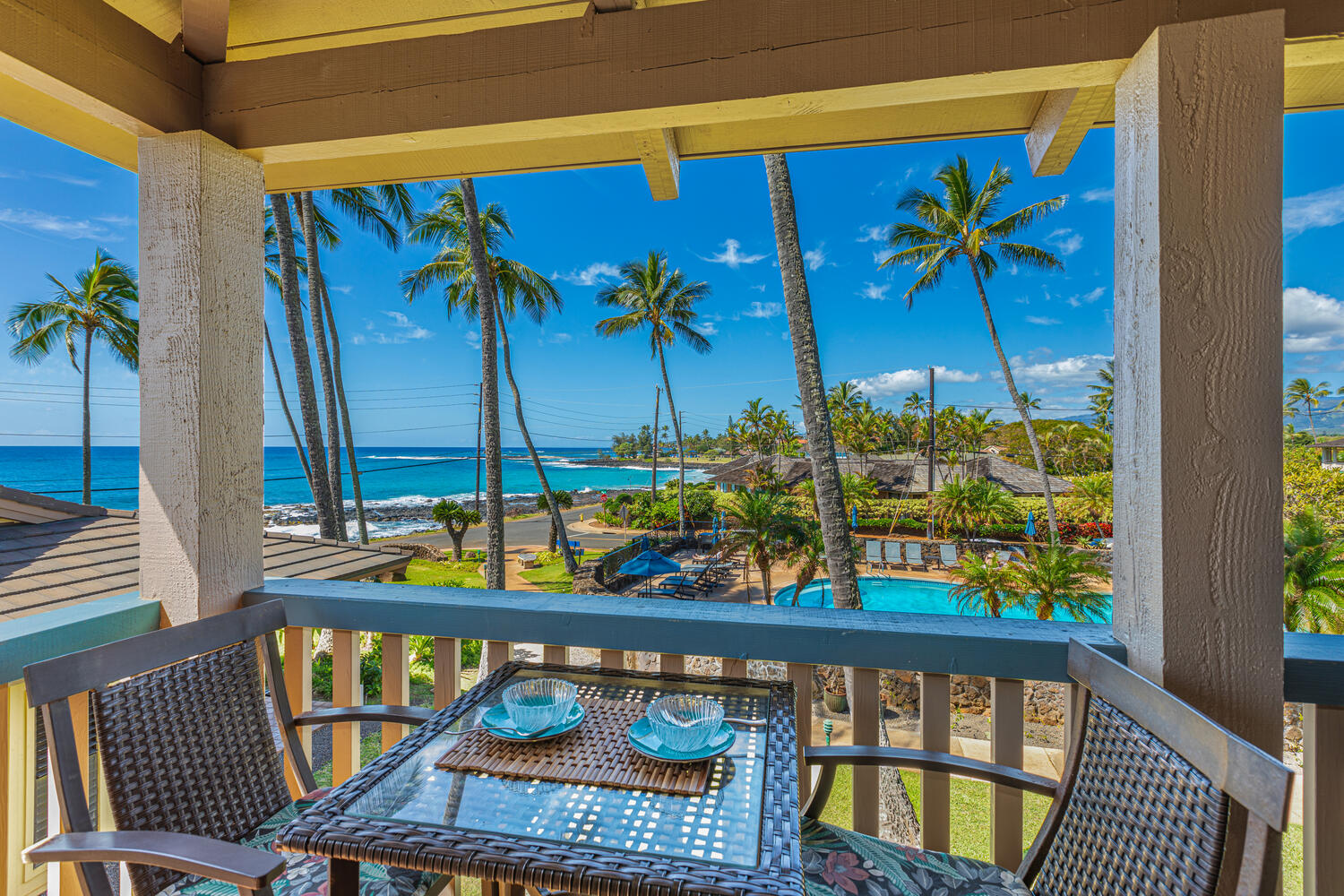 1870 Hoone Road, Unit 200 Koloa, HI 96756 - Photo 17 of 23 a view of an chairs and table in the balcony