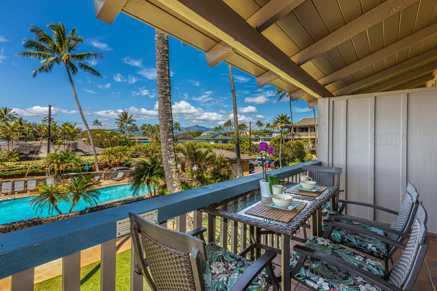 1870 Hoone Road, Unit 200 Koloa, HI 96756 - Photo 18 of 23 a view of a balcony with chairs