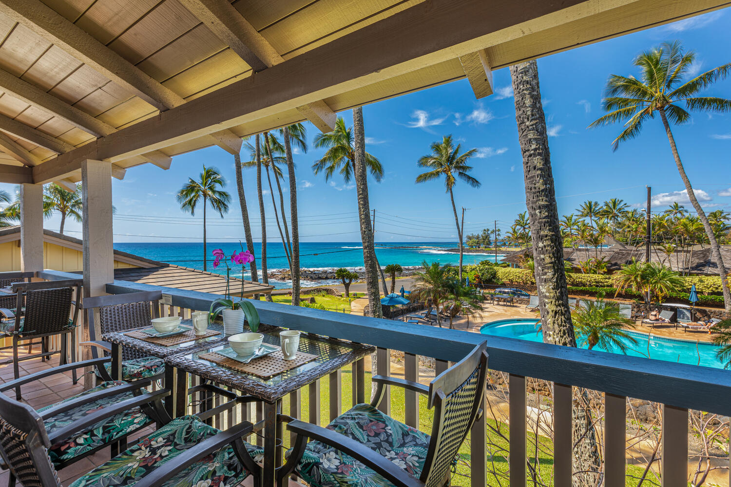 1870 Hoone Road, Unit 200 Koloa, HI 96756 - Photo 4 of 23 a view of a balcony with chairs