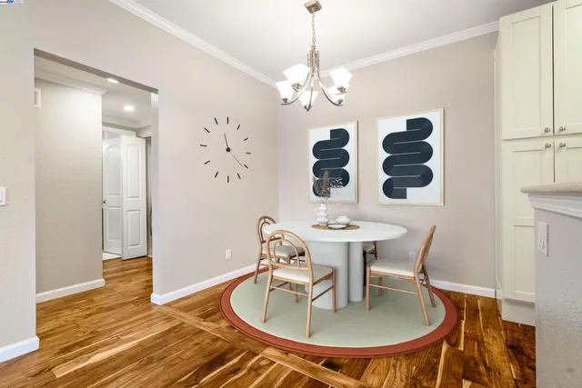 a kitchen with cabinets appliances and a sink