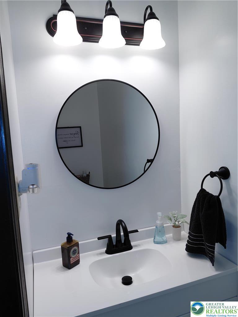 1020 East Main Street Weatherly, PA 18255 - Photo 15 of 35 a bathroom with a sink and a mirror