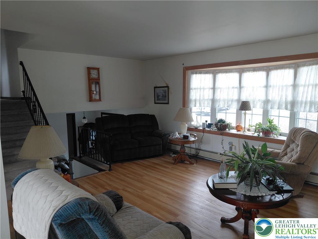 1020 East Main Street Weatherly, PA 18255 - Photo 19 of 28 a living room with furniture and a potted plant