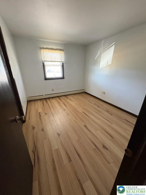 1020 East Main Street Weatherly, PA 18255 - Photo 31 of 35 an empty room with wooden floor and windows