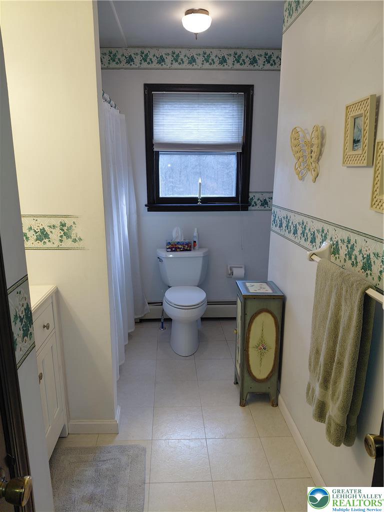 1020 East Main Street Weatherly, PA 18255 - Photo 35 of 35 a bathroom with a toilet sink and mirror