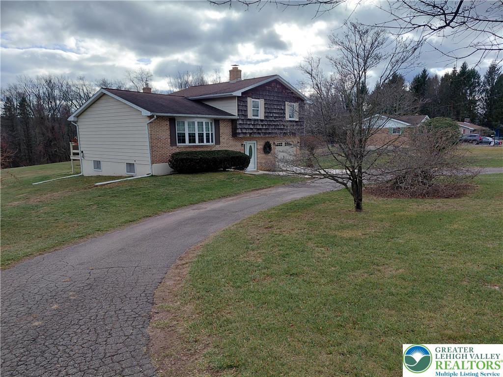 1020 East Main Street Weatherly, PA 18255 - Photo 4 of 28 a view of a house with a yard