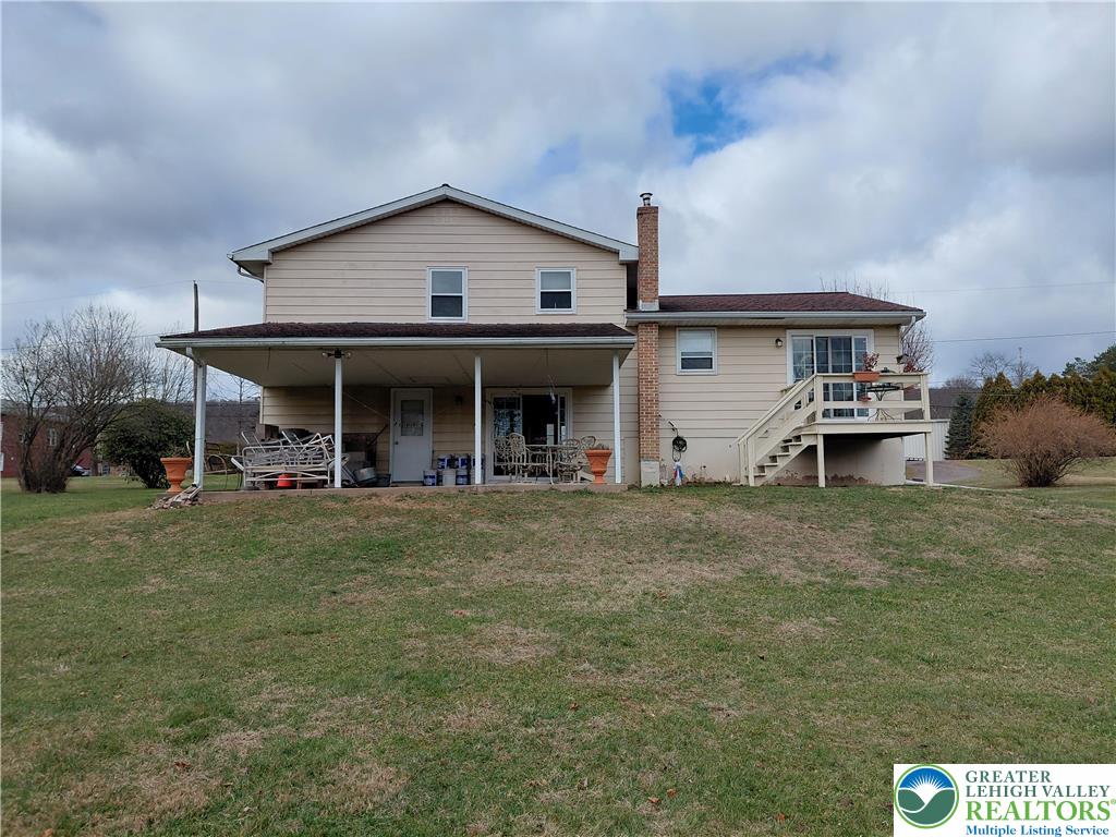 1020 East Main Street Weatherly, PA 18255 - Photo 6 of 28 a front view of a house with a garden