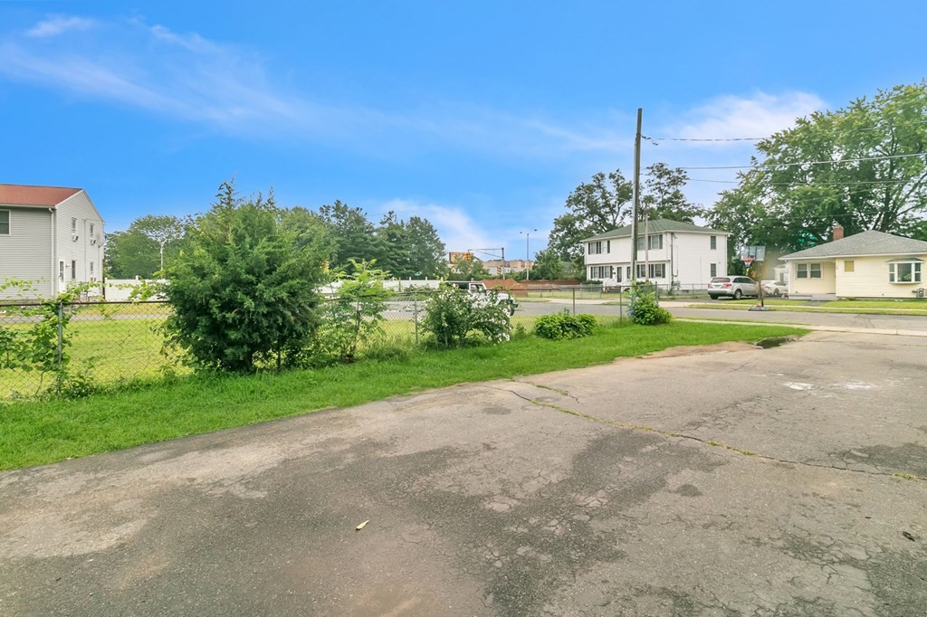 18 Porter Street Springfield, MA 01104 - Photo 42 of 42 a view of a city with tall buildings and a big yard