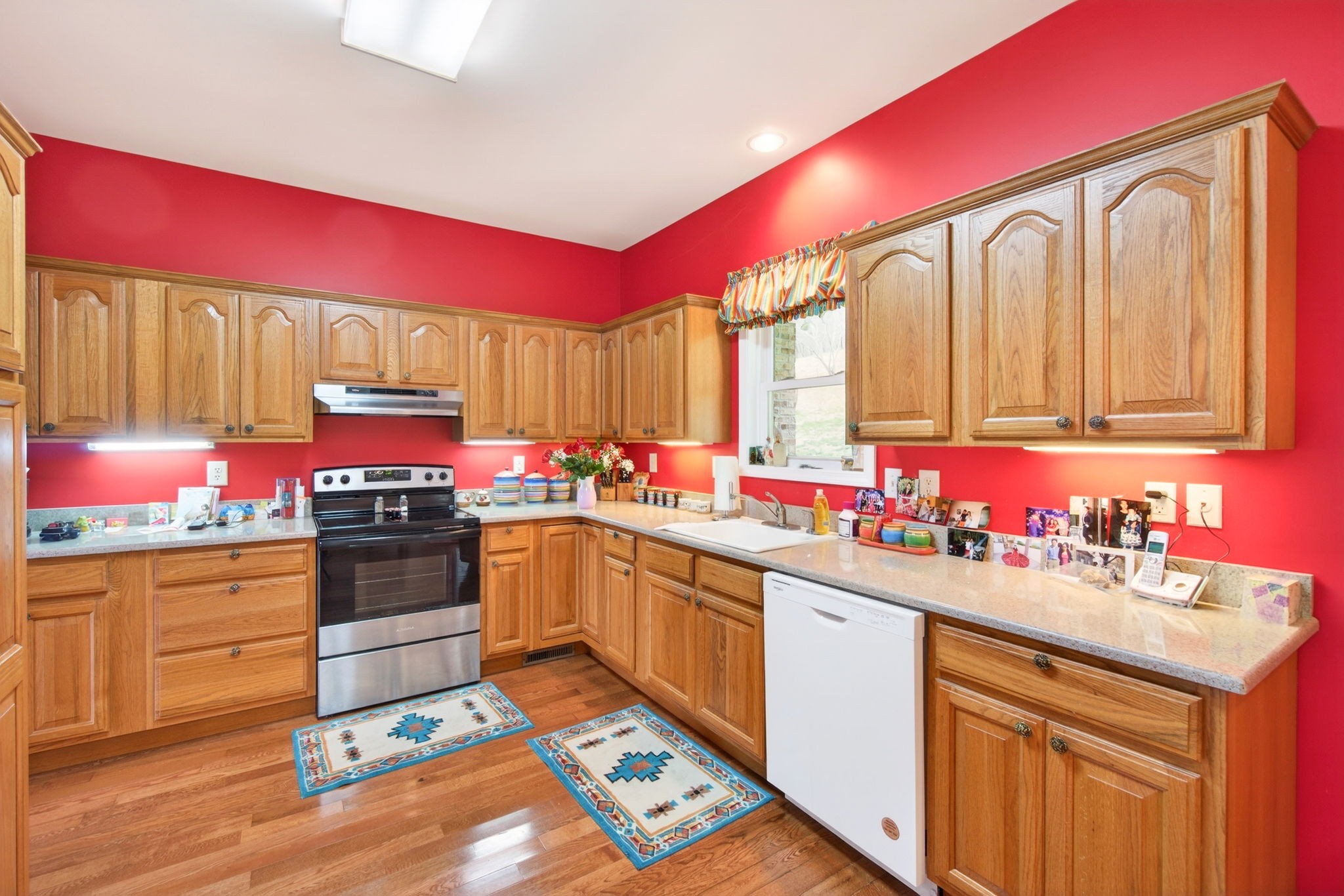 444 Mackie Road Sparta, TN 38583 - Photo 5 of 31 a kitchen with a sink cabinets and stove top oven