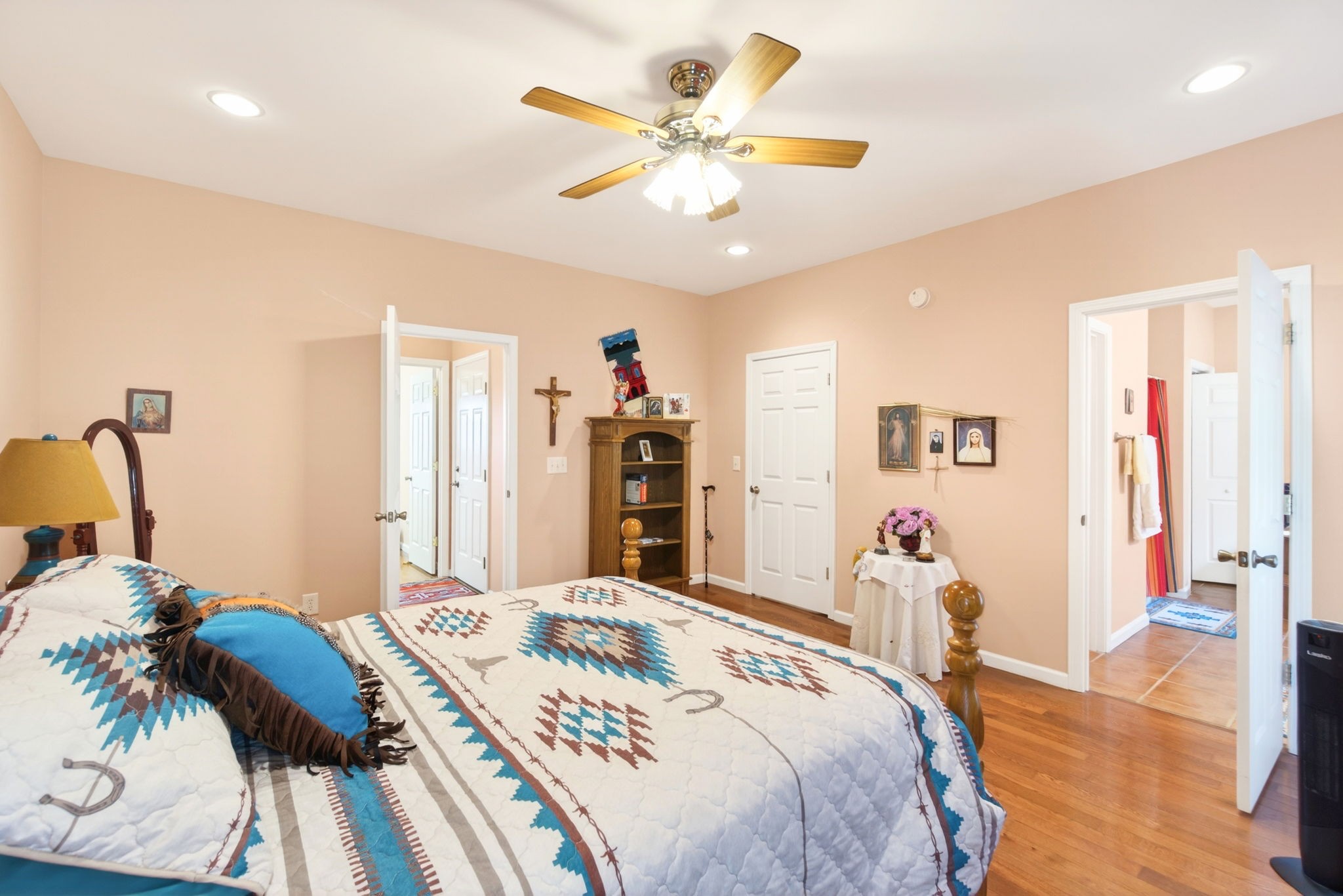 444 Mackie Road Sparta, TN 38583 - Photo 8 of 31 a bedroom with a bed and a chandelier