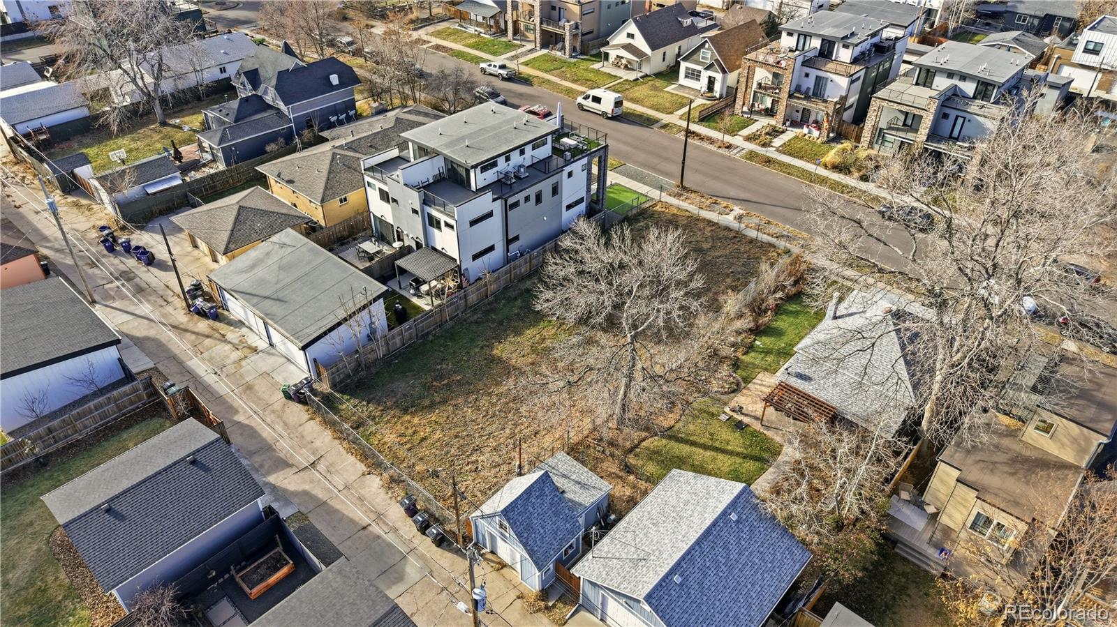 4452 Raleigh Street Denver, CO 80212 - Photo 5 of 11 an aerial view of a house with a yard