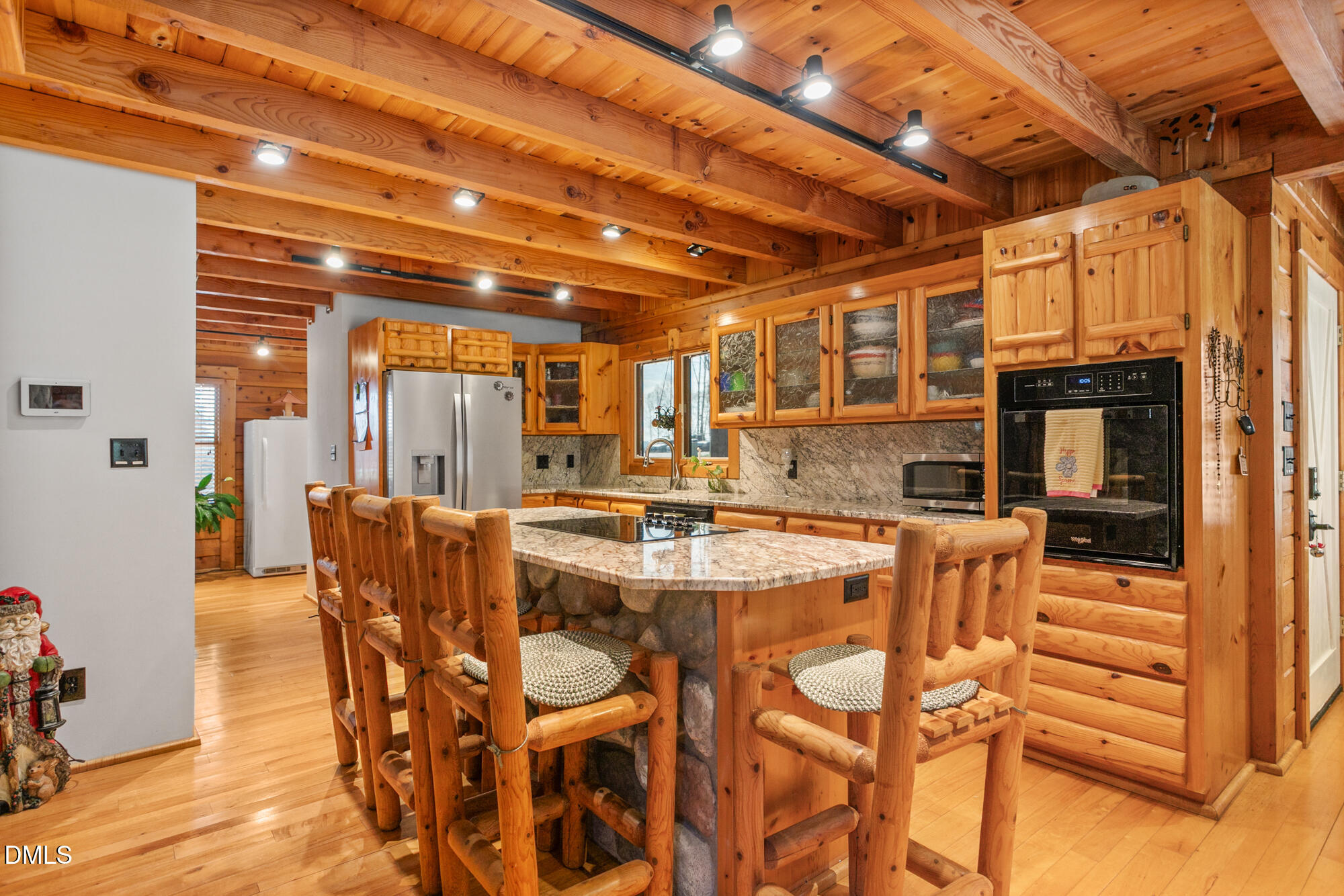 1750 Kerner Road Kernersville, NC 27284 - Photo 11 of 44 a view of a dining room with furniture and wooden floor