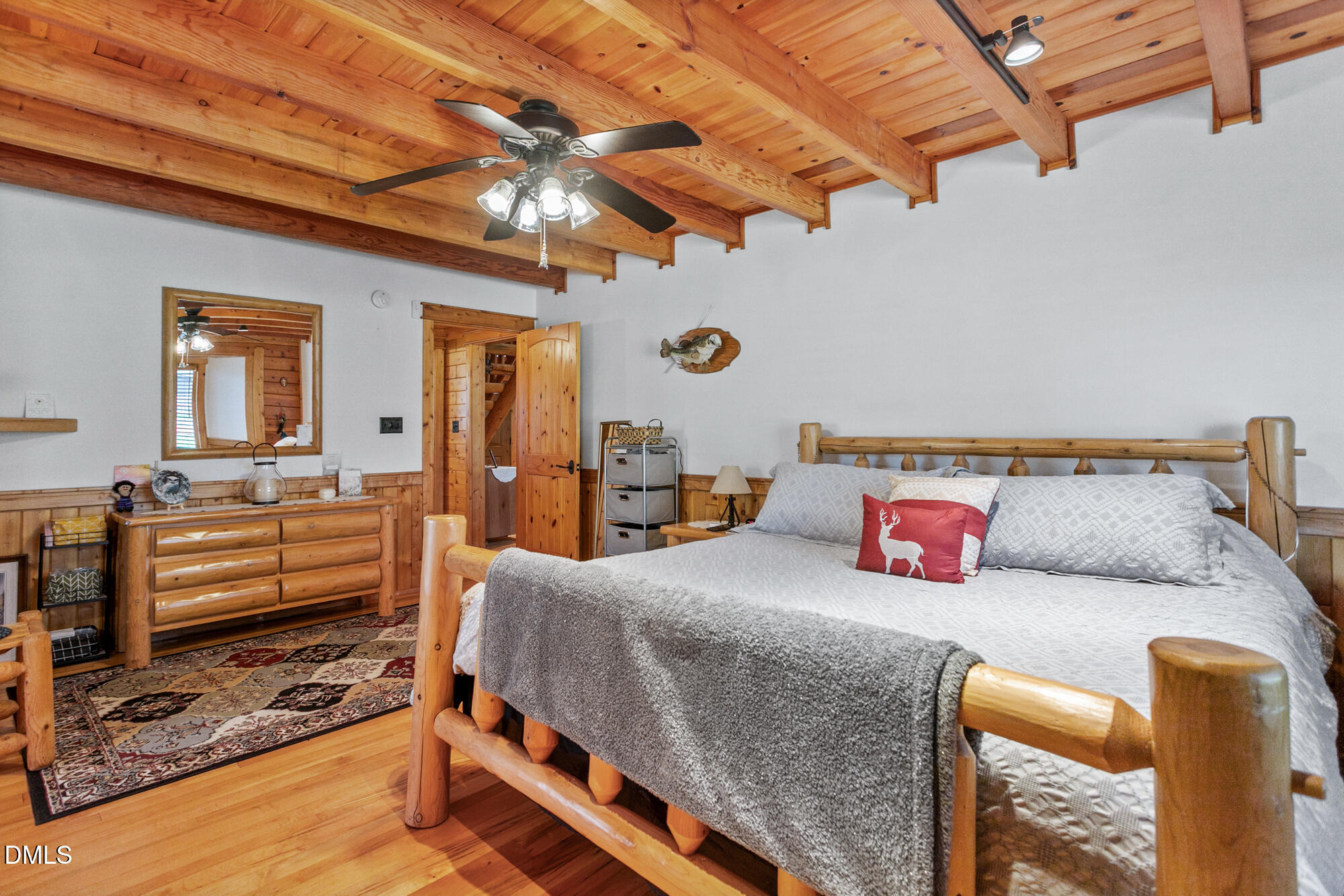 1750 Kerner Road Kernersville, NC 27284 - Photo 22 of 44 a bedroom with a bed and wooden floor