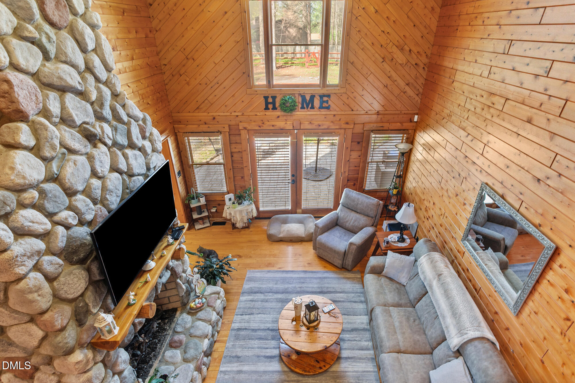 1750 Kerner Road Kernersville, NC 27284 - Photo 27 of 44 a living room with furniture and a fireplace