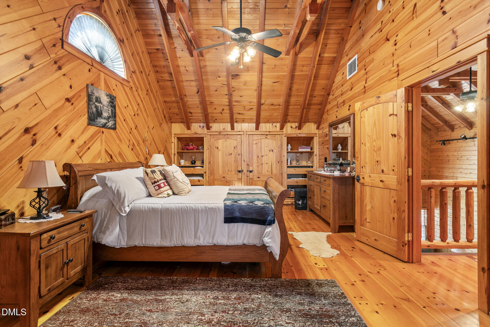 1750 Kerner Road Kernersville, NC 27284 - Photo 31 of 44 a bedroom with a bed and wooden floor