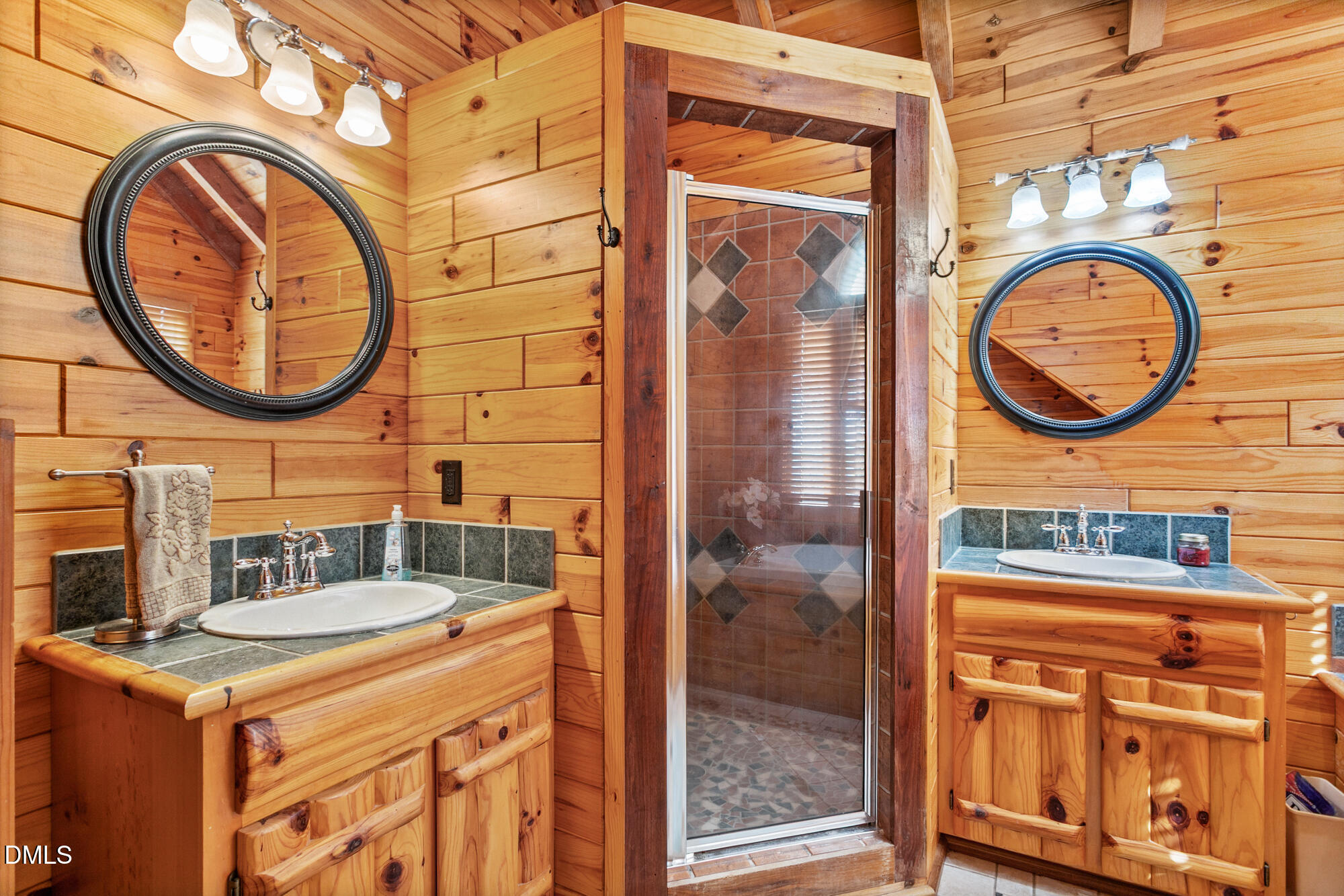 1750 Kerner Road Kernersville, NC 27284 - Photo 33 of 44 a bathroom with a sink and a mirror