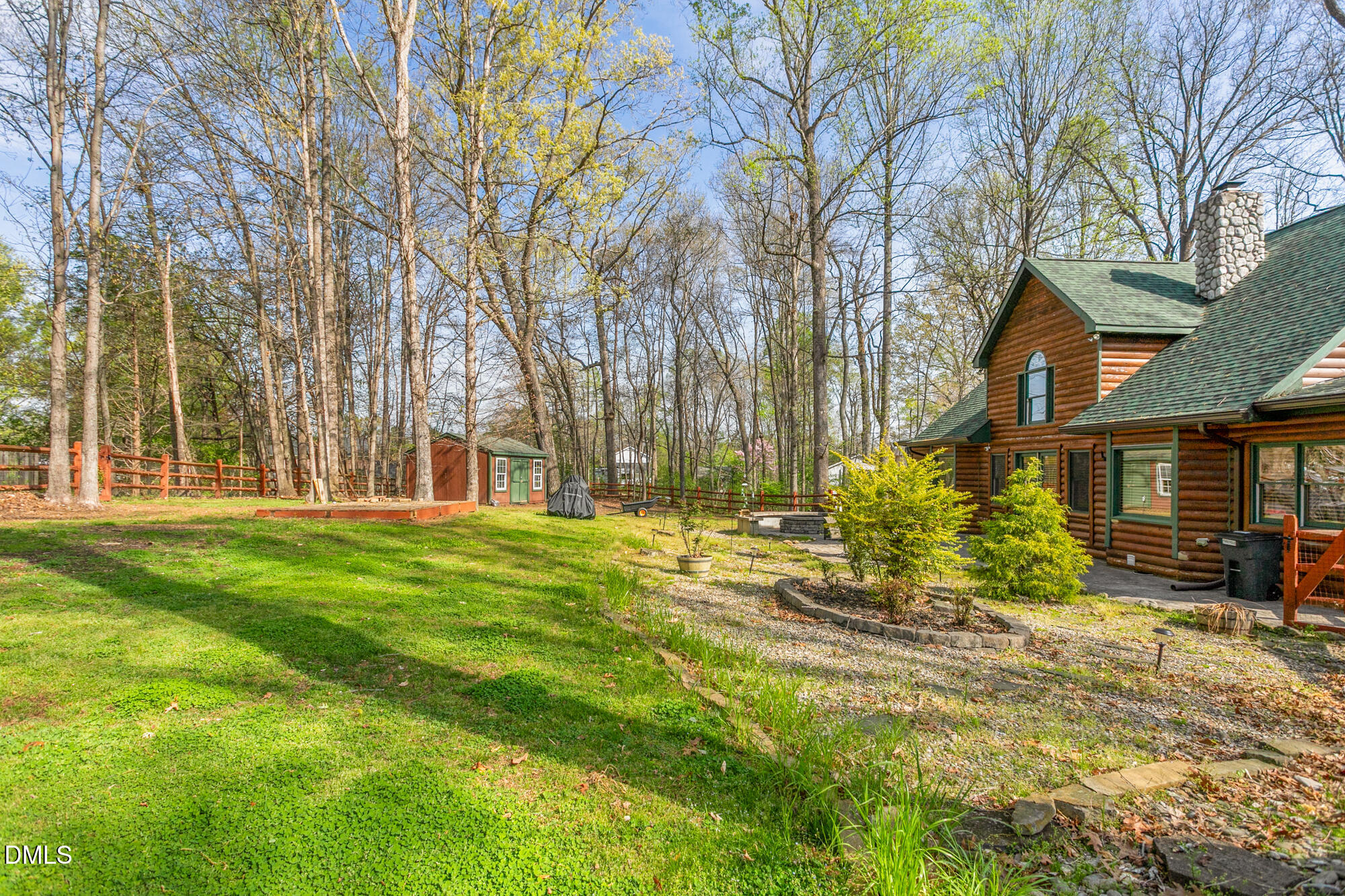 1750 Kerner Road Kernersville, NC 27284 - Photo 43 of 44 a view of a house with backyard and sitting area