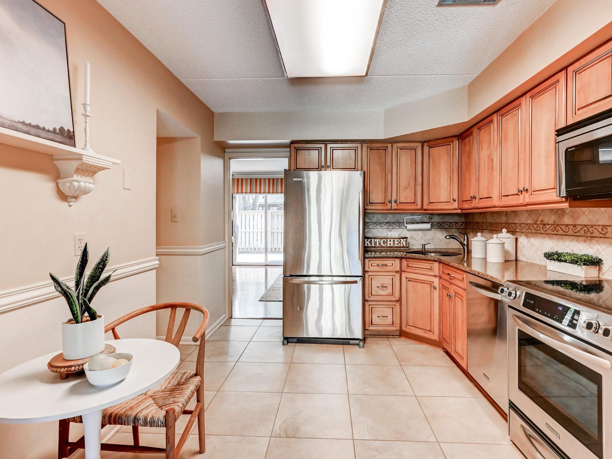 17 Pacers Lane, Unit F Pikesville, MD 21208 - Photo 7 of 24 Updated Kitchen with granite & stainless