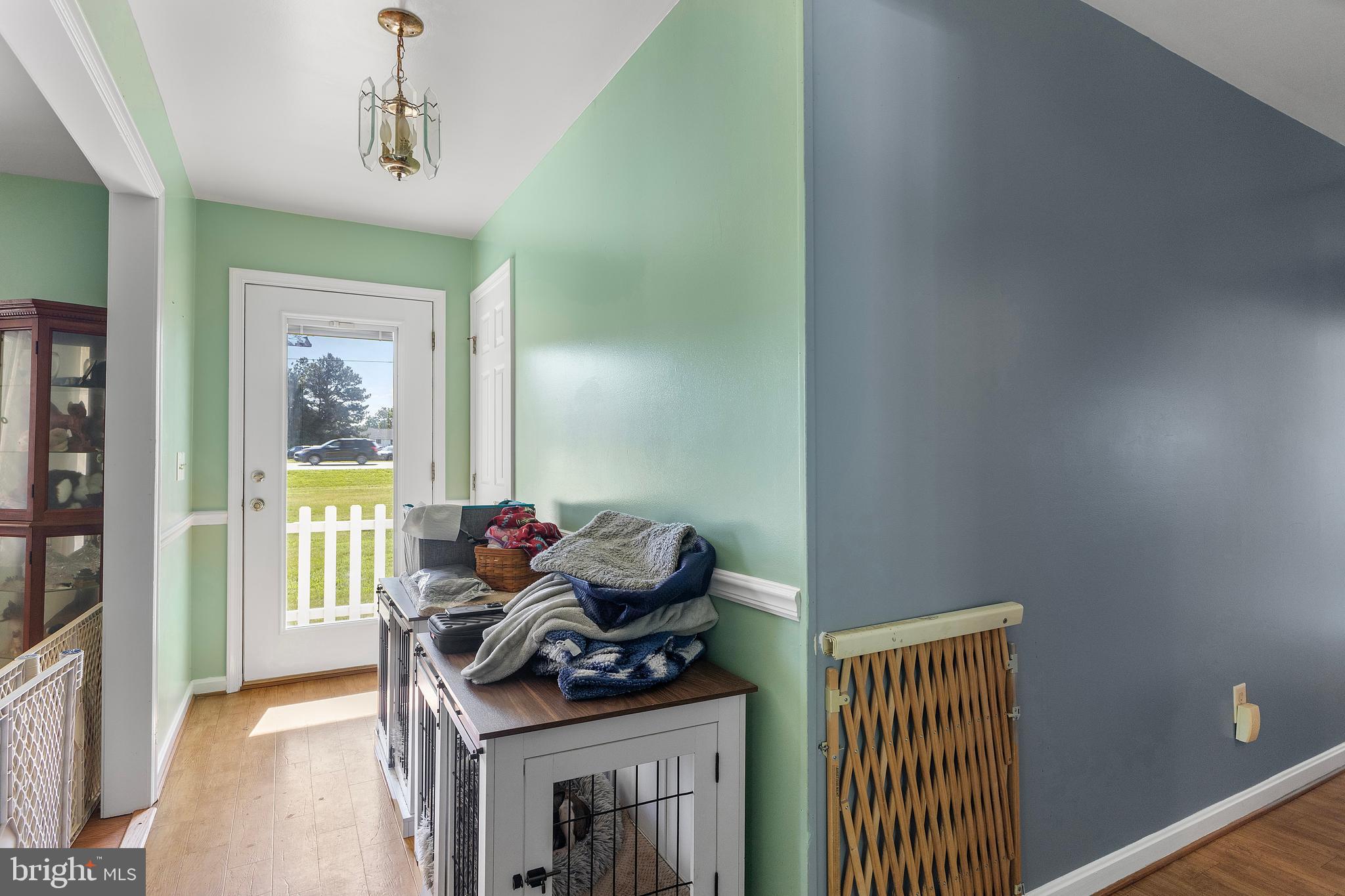 7112 East New Market Ellwood Road Hurlock, MD 21643 - Photo 21 of 41 a bedroom with furniture and natural light