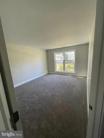 a bathroom with a shower and a toilet
