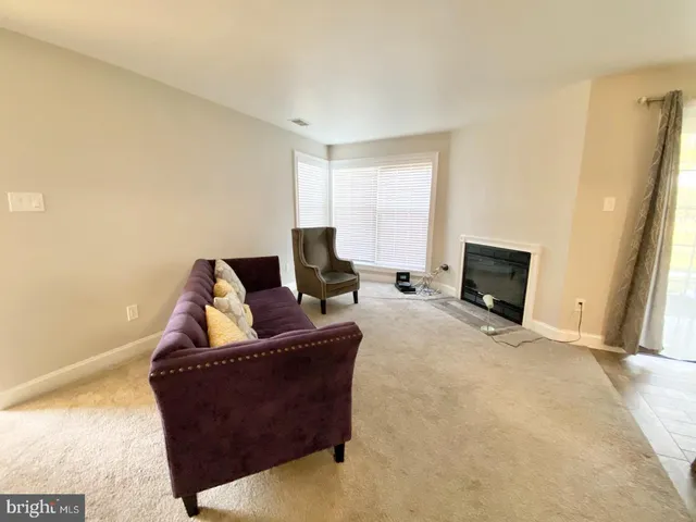 a view of a livingroom with a fireplace