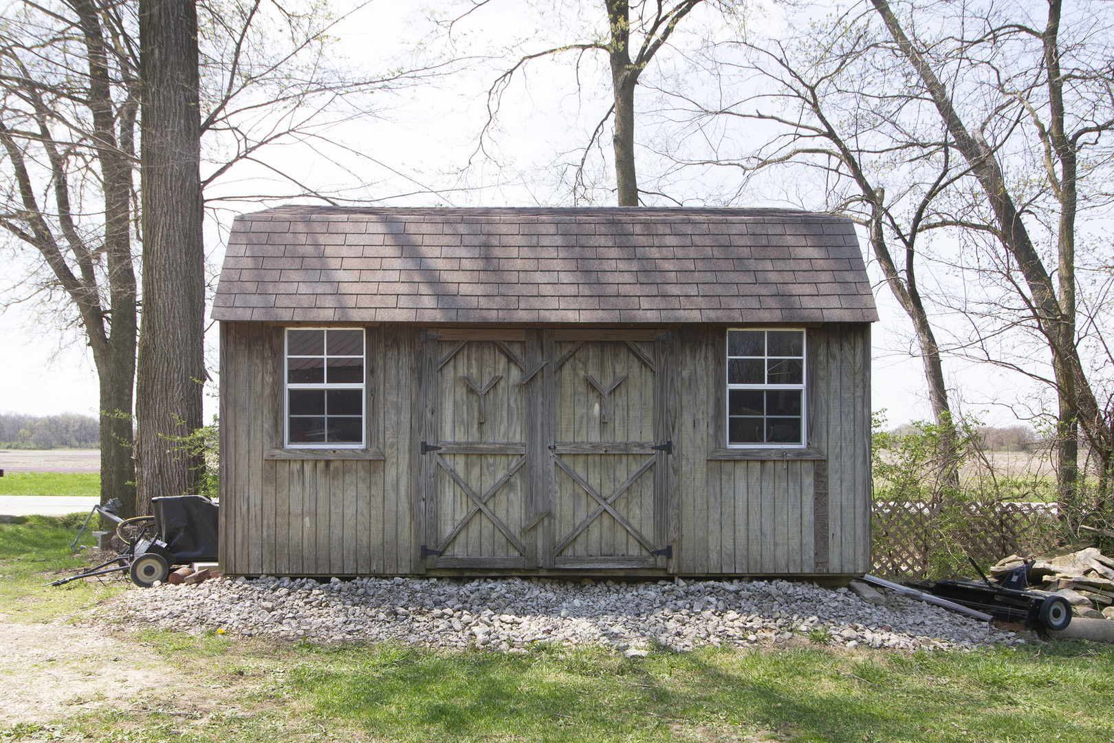 5585 River Road Kankakee, IL 60901 - Photo 21 of 30 a view of a house with a small yard and wooden fence
