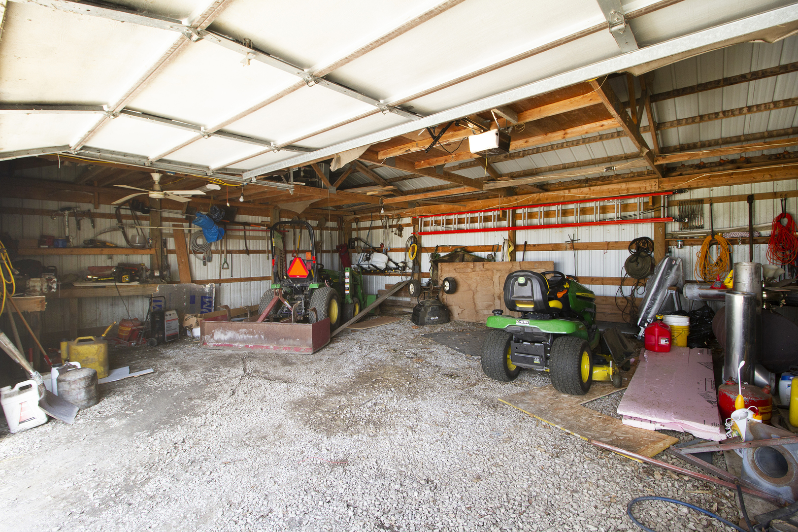 5585 River Road Kankakee, IL 60901 - Photo 23 of 30 a view of a storage room with a lot of stuff
