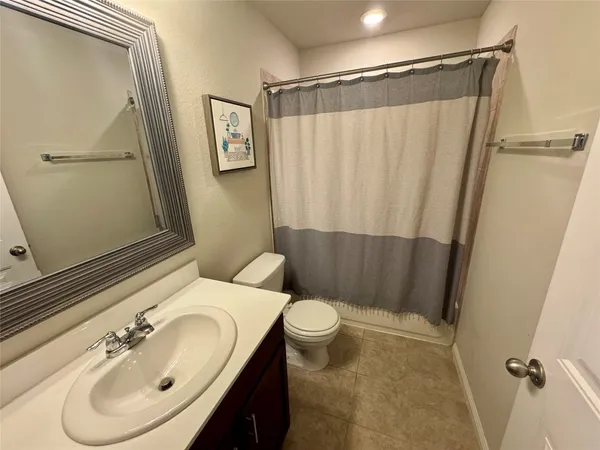 an empty room with a empty space and windows