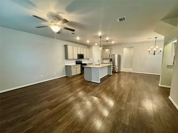a view of a kitchen and a sink