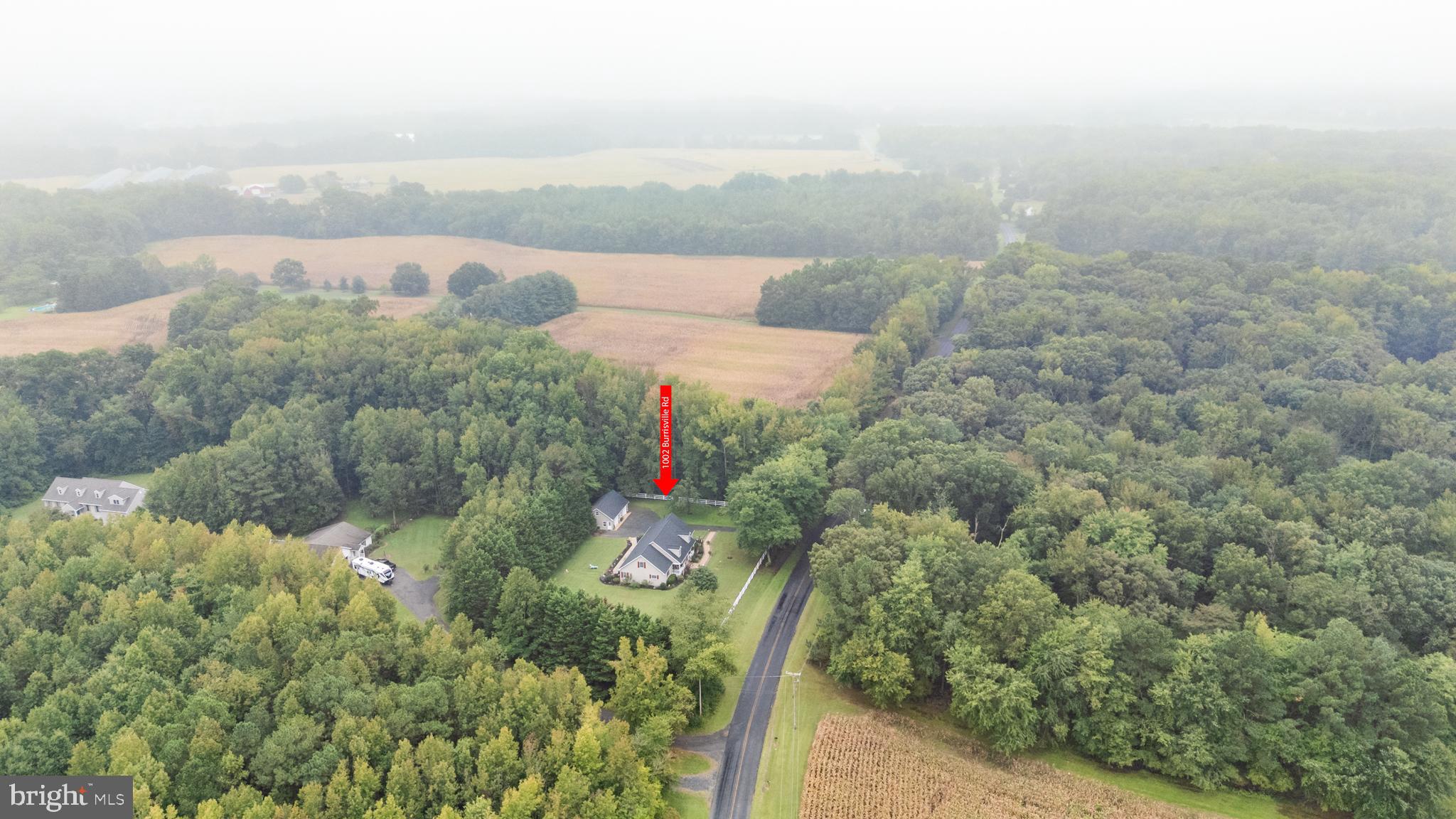 1002 Burrisville Road Centreville, MD 21617 - Photo 14 of 50 a view of a lake with a city