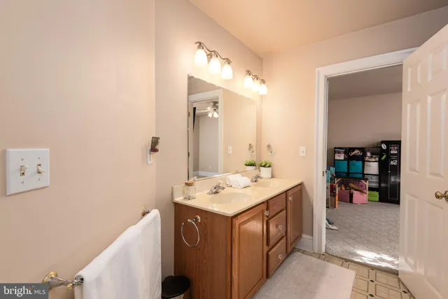 a view of a livingroom with furniture and staircase