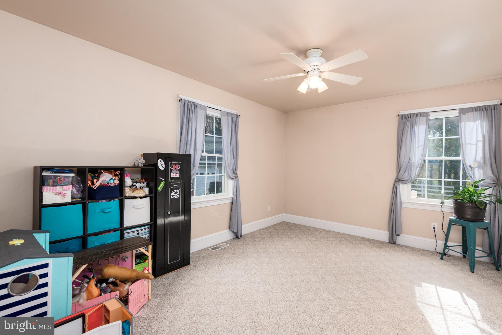 1002 Burrisville Road Centreville, MD 21617 - Photo 38 of 50 a view of a livingroom with furniture and staircase