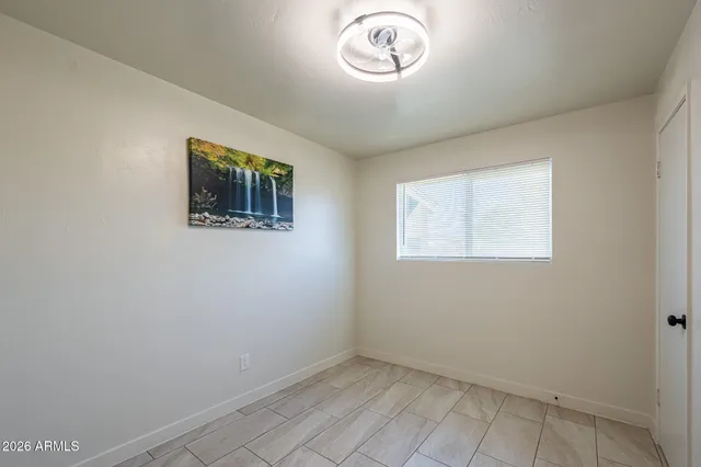 an empty room with a window