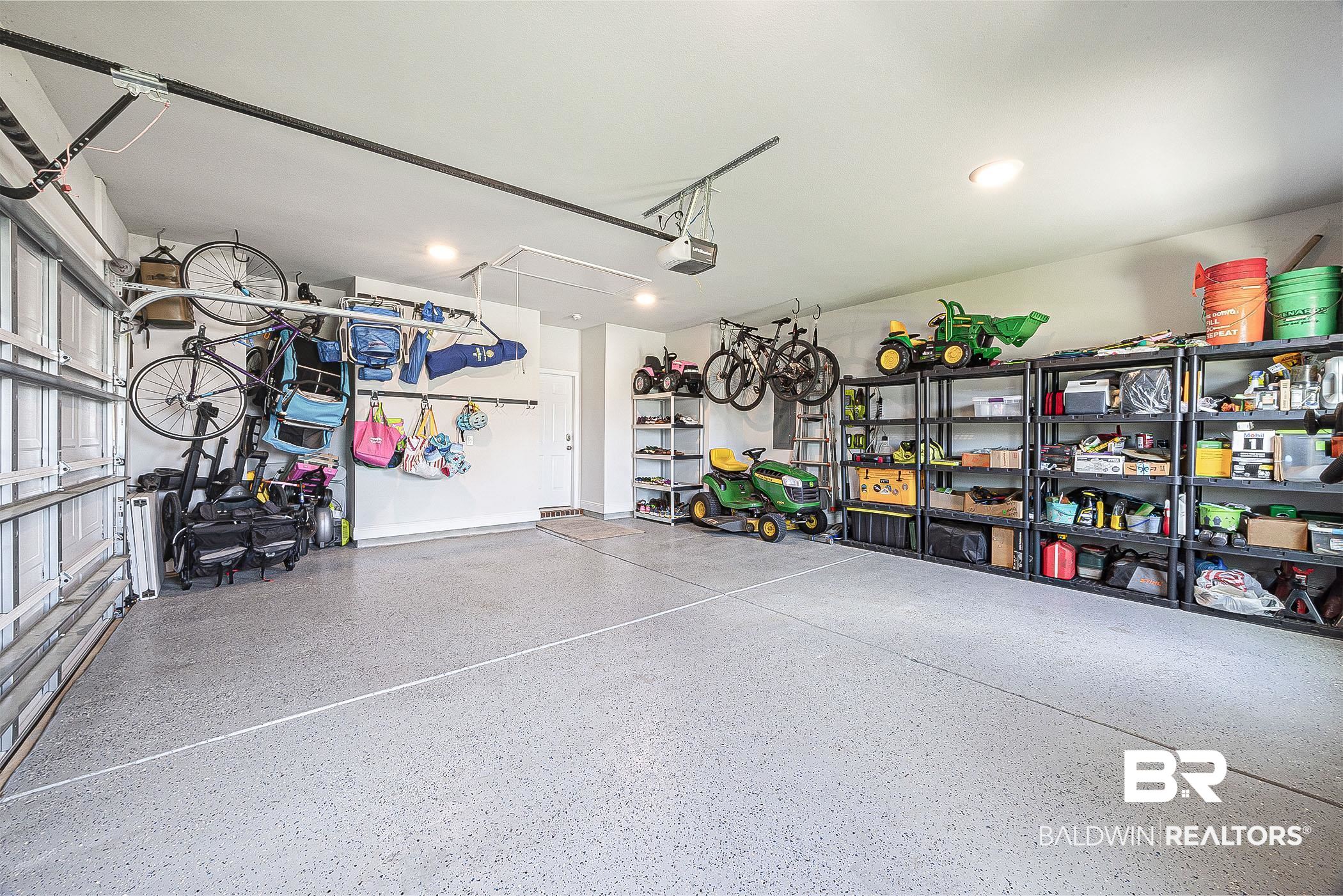 11044 Native Dancer Way Daphne, AL 36526 - Photo 35 of 67 Garage with a garage door opener
