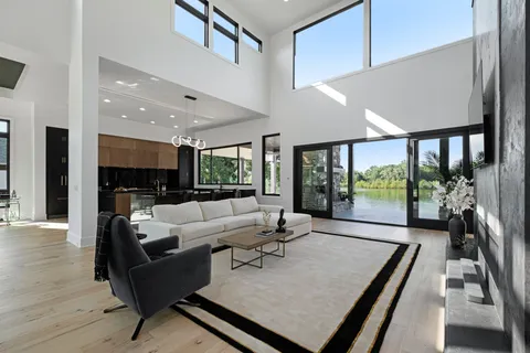 a kitchen with granite countertop a stove and a sink