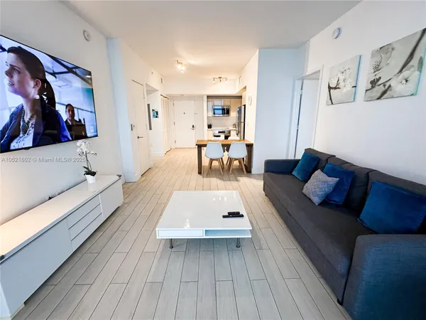 a living room with furniture and a couch
