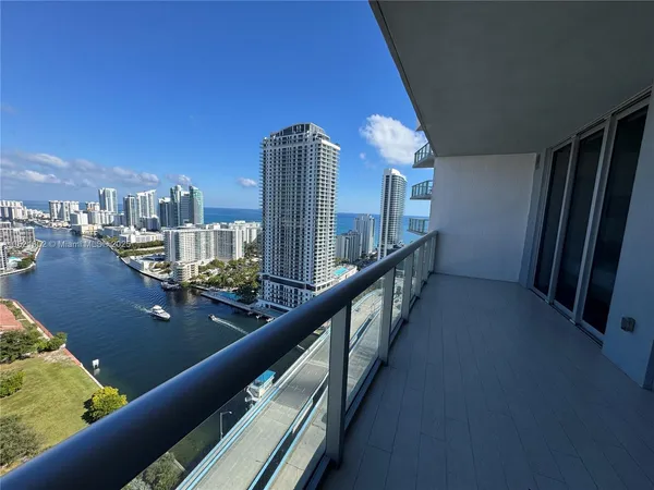 a view of balcony and dining room